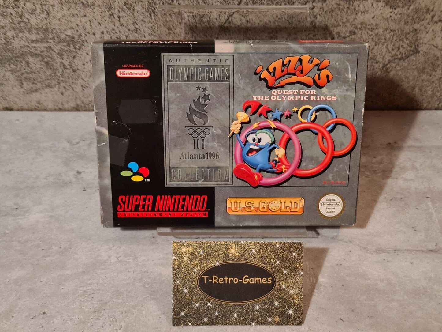 SNES Super Nintendo Izzy's Quest for the Olympic Rings mit OVP und Anleitung EUR - T-Retro-Games