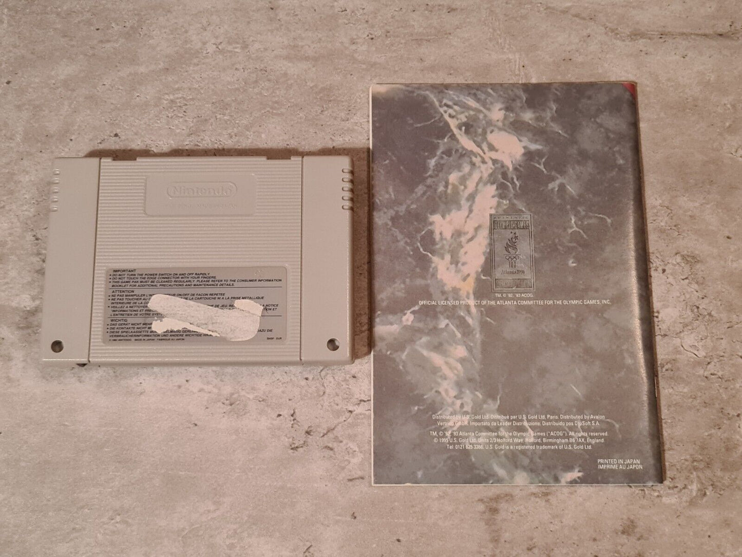 SNES Super Nintendo Izzy's Quest for the Olympic Rings mit OVP und Anleitung EUR - T-Retro-Games