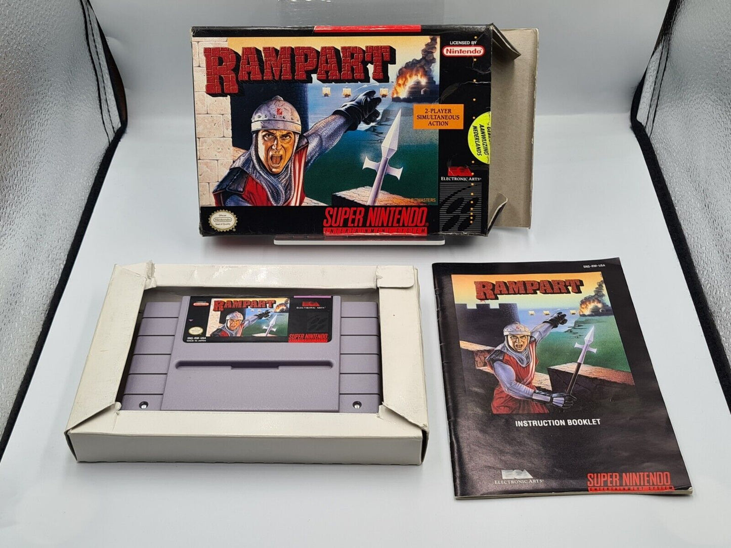 SNES Super Nintendo Rampart mit OVP und Anleitung NTSC-USA - T-Retro-Games