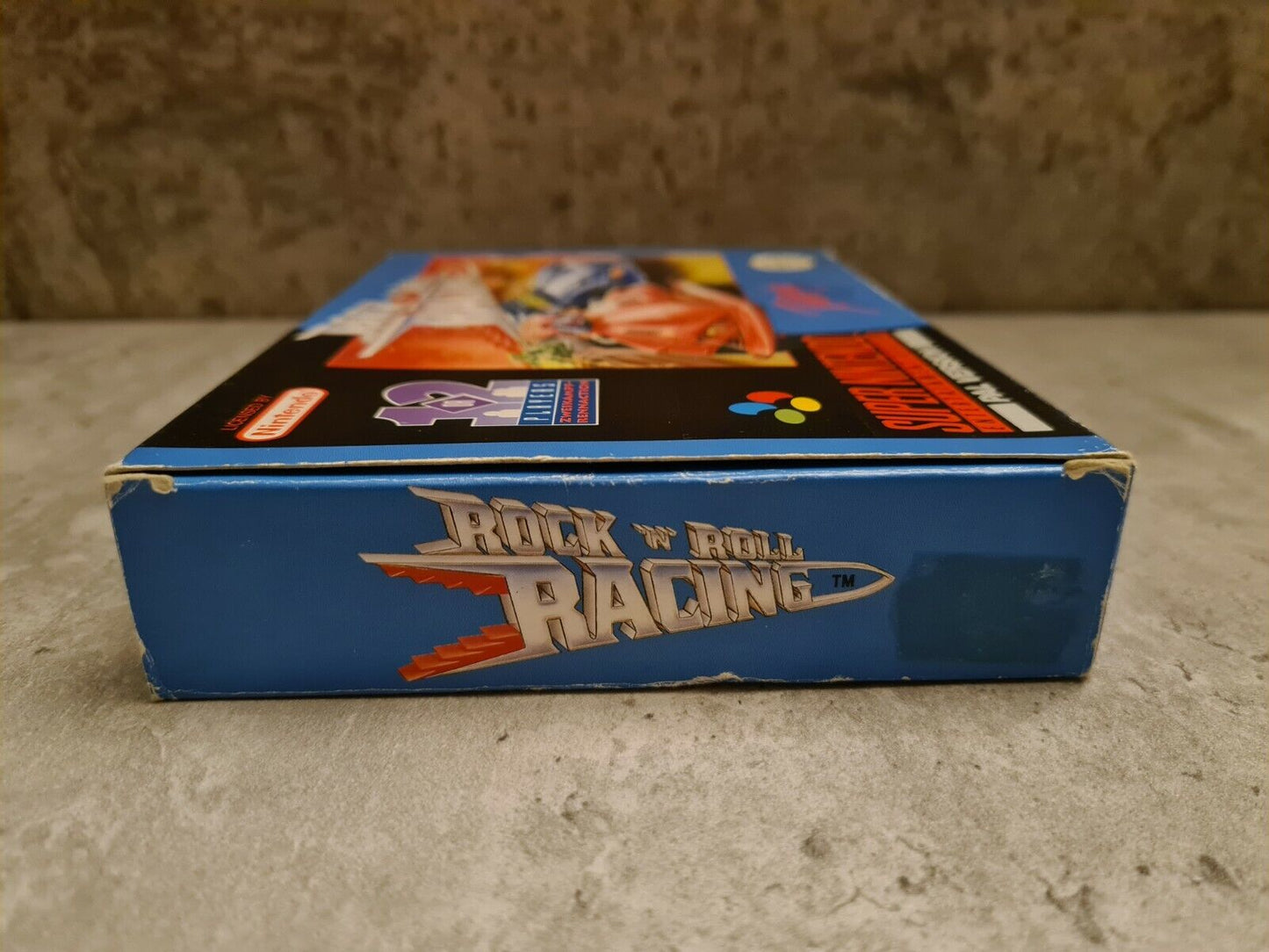 SNES Super Nintendo Rock N Roll Racing mit OVP und Anleitung NOE - T-Retro-Games