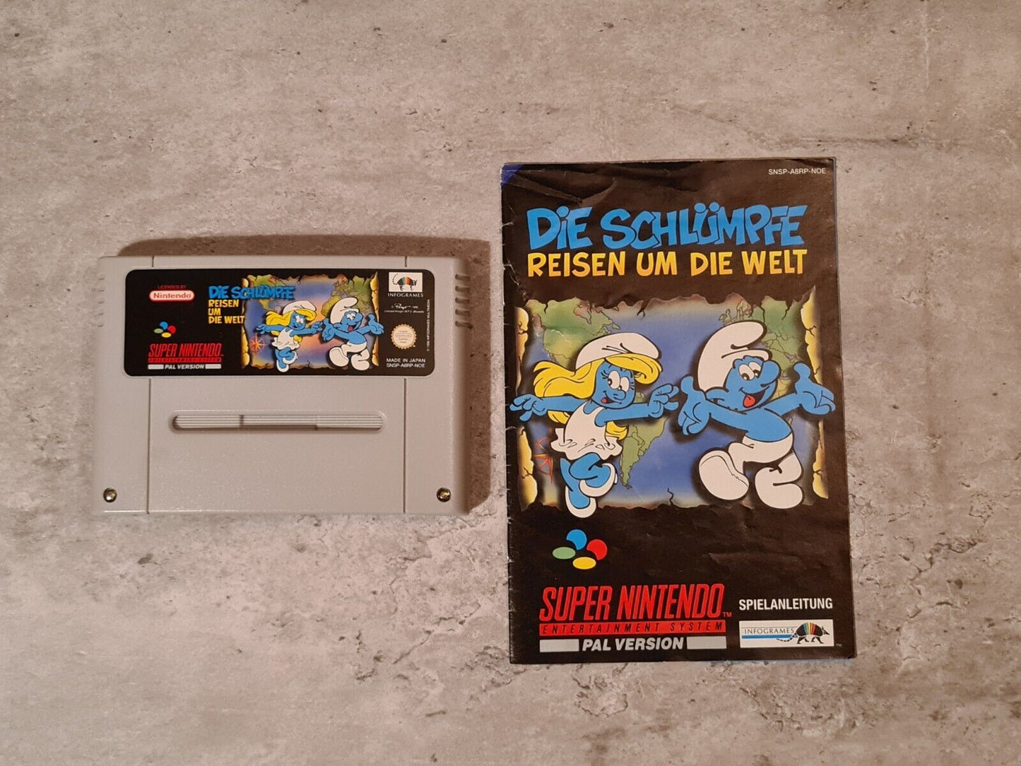 Super Nintendo Die Schlümpfe Reisen Um Die Welt mit OVP und Anleitung NOE - T-Retro-Games