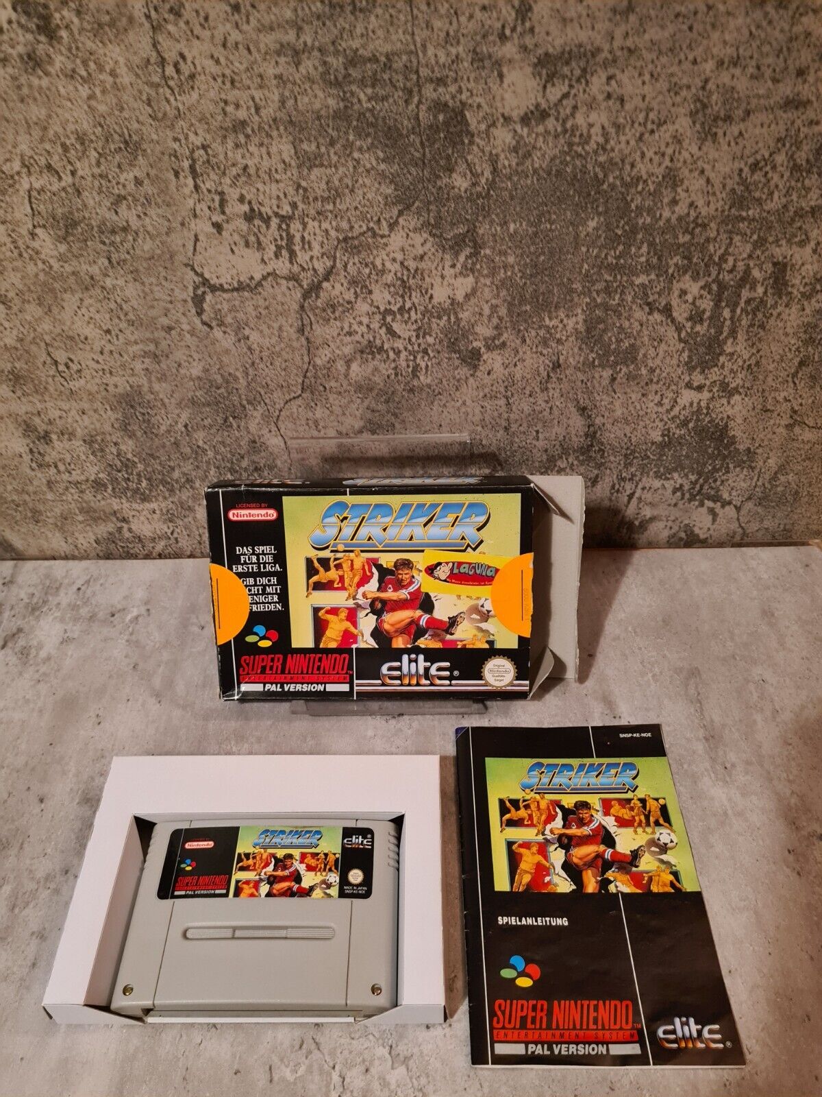 SNES Super Nintendo Striker mit OVP und Anleitung NOE - T-Retro-Games