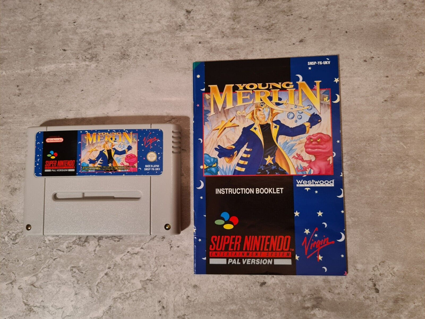 SNES Super Nintendo Young Merlin mit OVP und Anleitung + Players Guide UKV - T-Retro-Games
