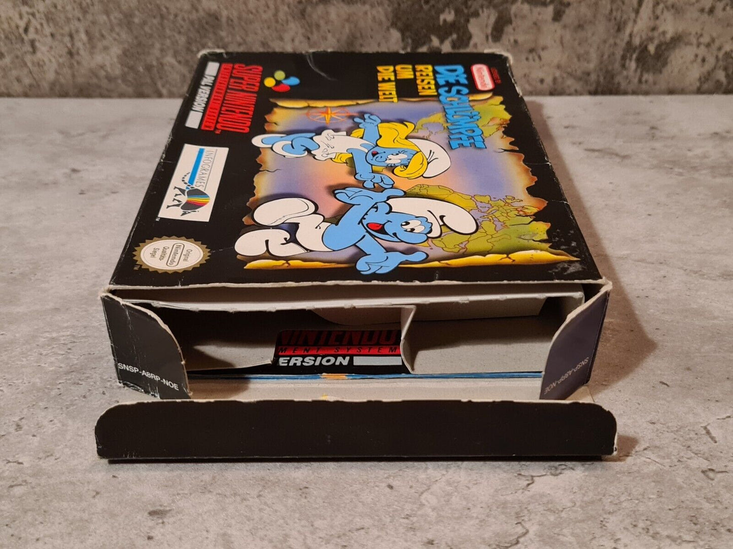 Super Nintendo Die Schlümpfe Reisen Um Die Welt mit OVP und Anleitung NOE - T-Retro-Games