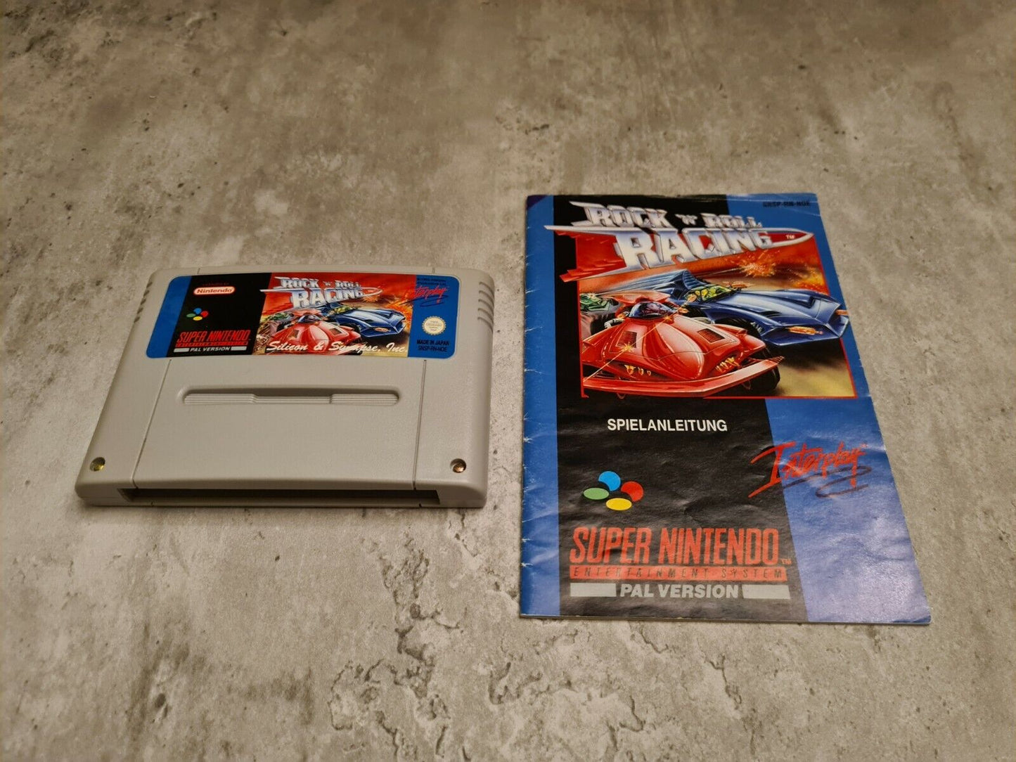 SNES Super Nintendo Rock N Roll Racing mit OVP und Anleitung NOE - T-Retro-Games