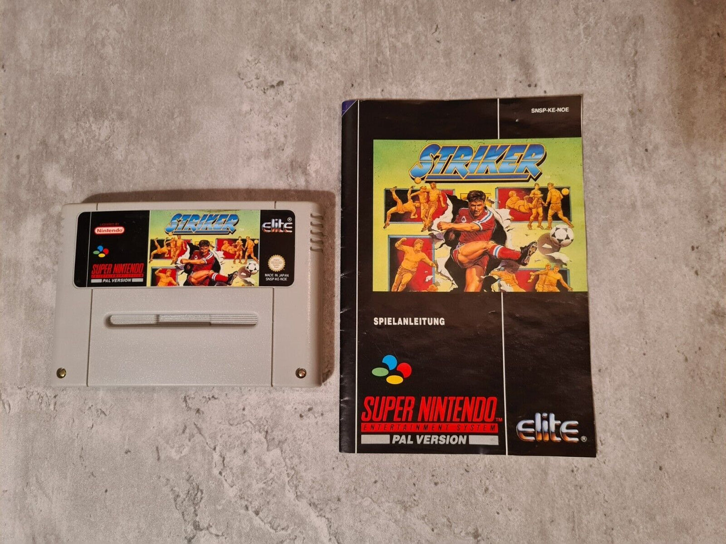 SNES Super Nintendo Striker mit OVP und Anleitung NOE - T-Retro-Games