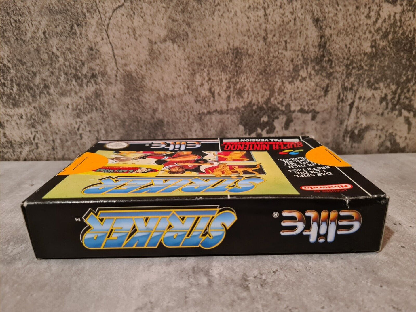 SNES Super Nintendo Striker mit OVP und Anleitung NOE - T-Retro-Games