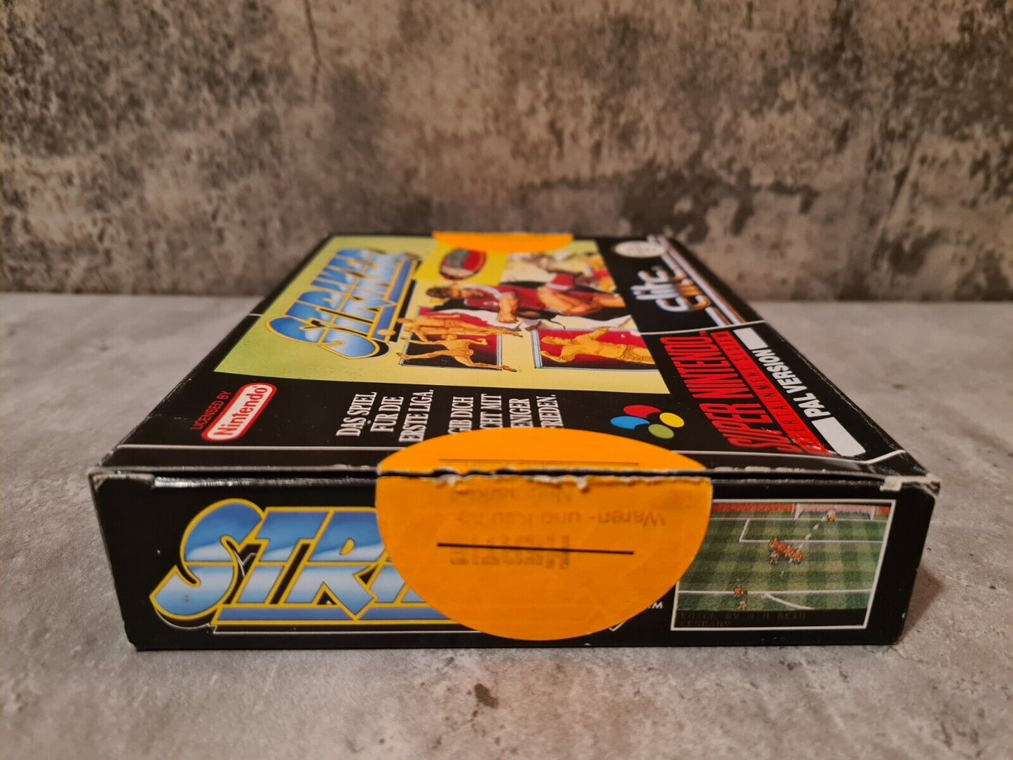 SNES Super Nintendo Striker mit OVP und Anleitung NOE - T-Retro-Games