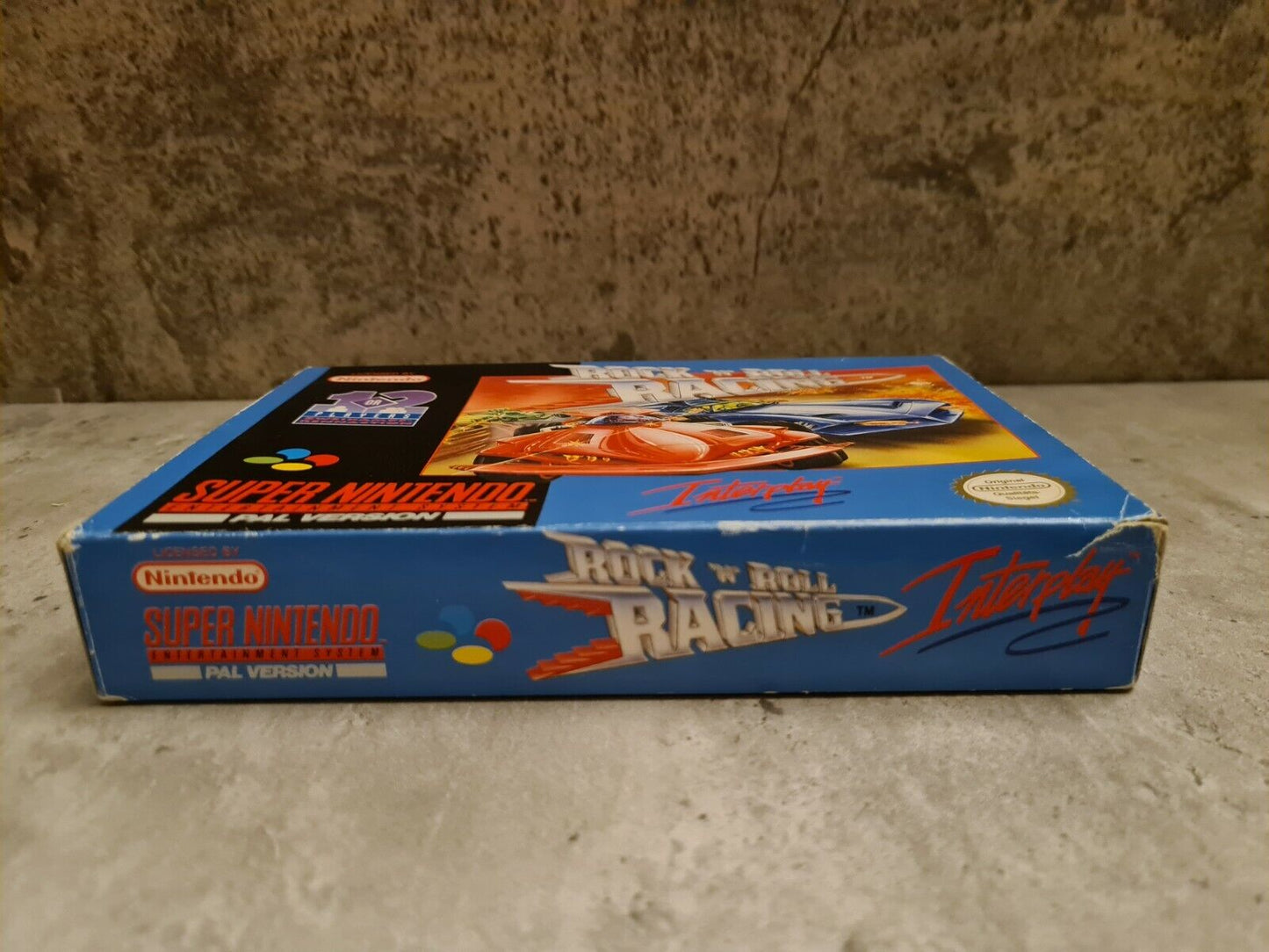 SNES Super Nintendo Rock N Roll Racing mit OVP und Anleitung NOE - T-Retro-Games