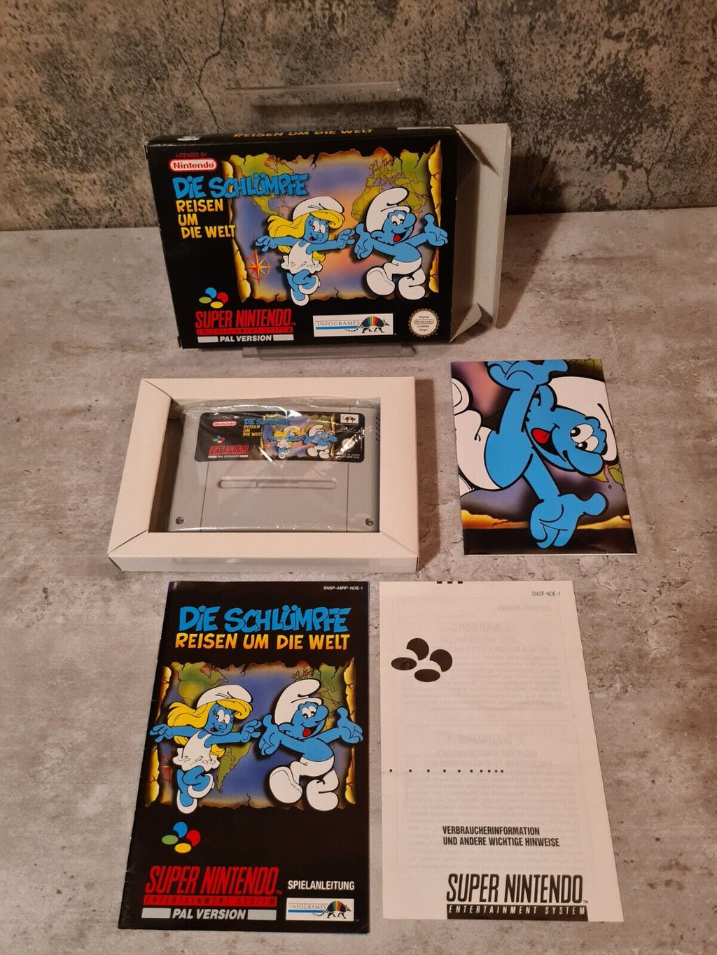 Super Nintendo Die Schlümpfe Reisen um die Welt + OVP + Anleitung + Poster NOE - T-Retro-Games 