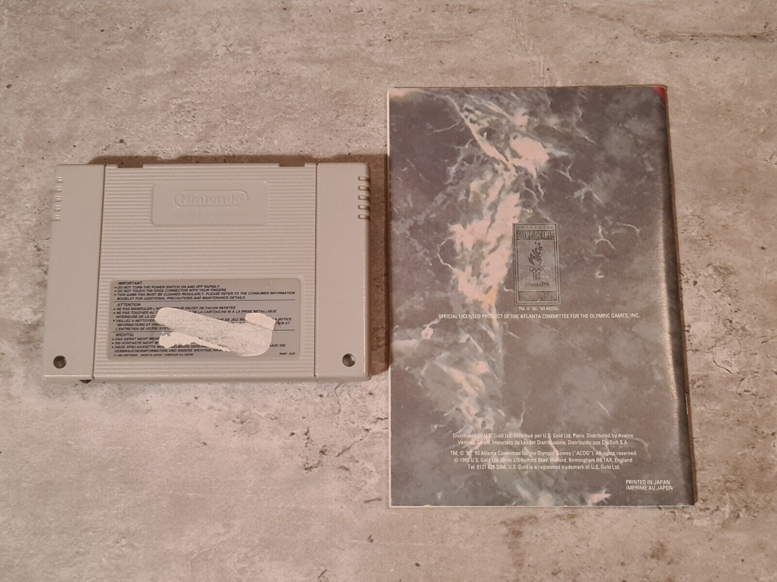 SNES Super Nintendo Izzy's Quest for the Olympic Rings mit OVP und Anleitung EUR - T-Retro-Games 