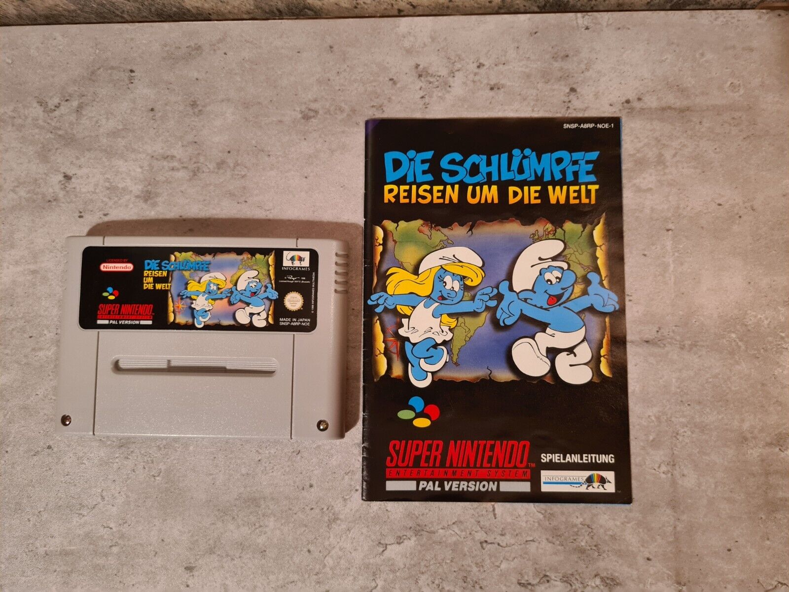 Super Nintendo Die Schlümpfe Reisen um die Welt + OVP + Anleitung + Poster NOE - T-Retro-Games 