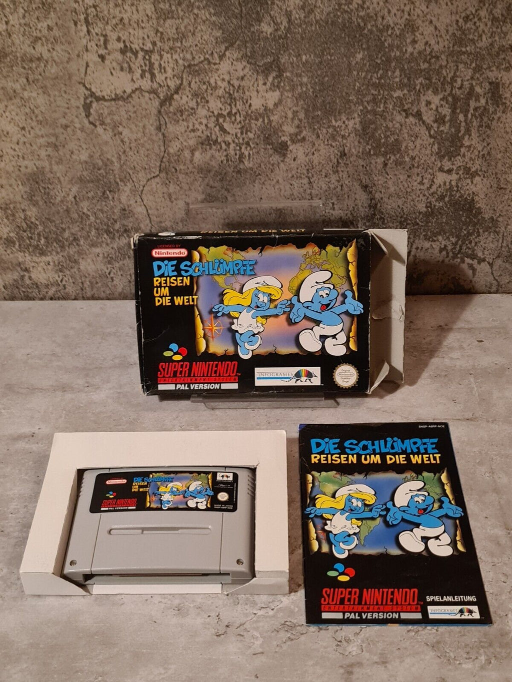 Super Nintendo Die Schlümpfe Reisen Um Die Welt mit OVP und Anleitung NOE - T-Retro-Games 