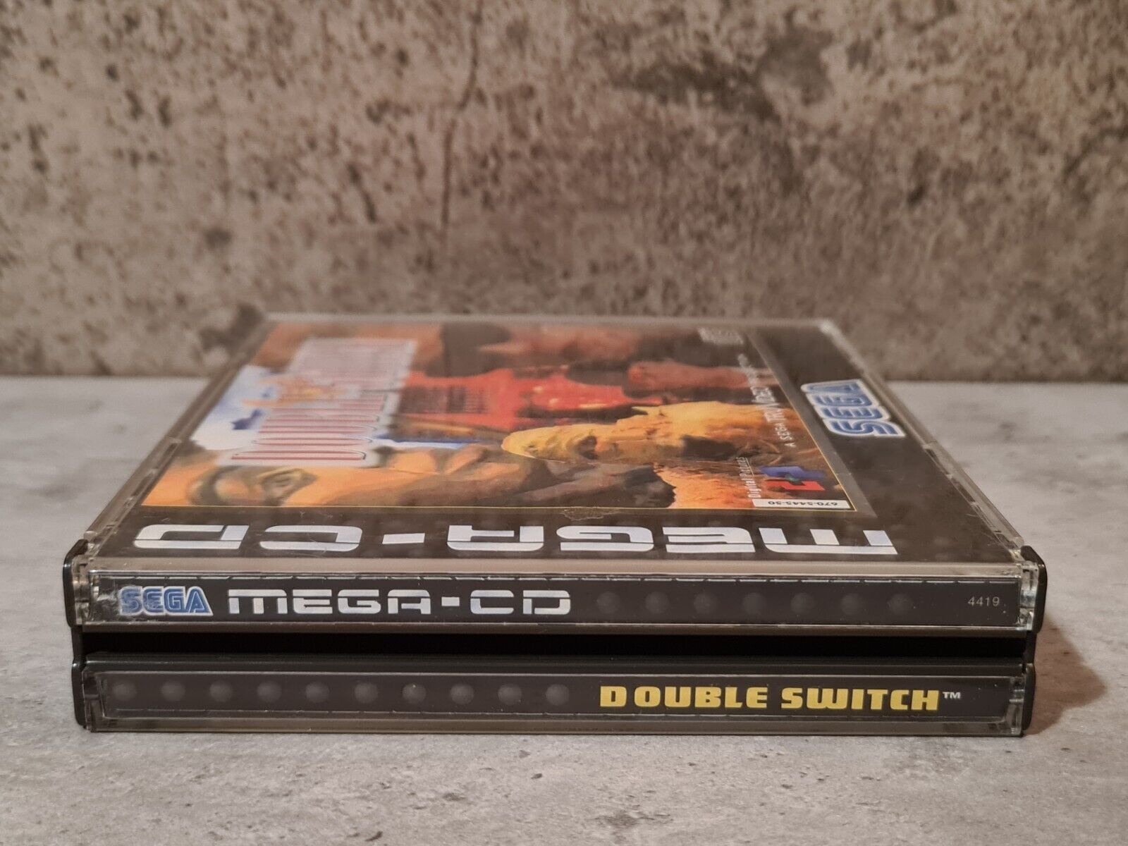 Sega Mega-CD Double Switch mit OVP und Anleitung Multi Language - T-Retro-Games 