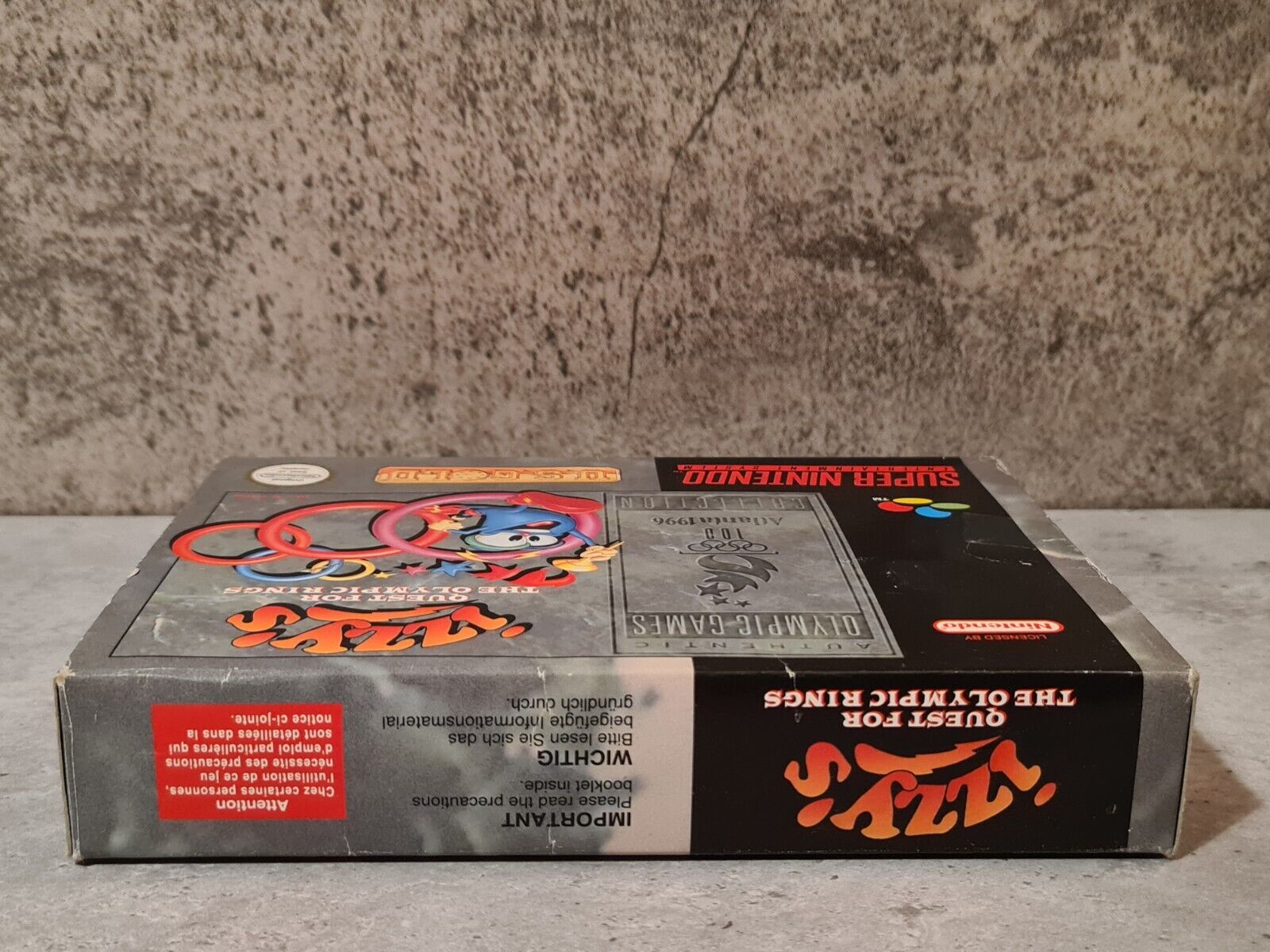 SNES Super Nintendo Izzy's Quest for the Olympic Rings mit OVP und Anleitung EUR - T-Retro-Games 