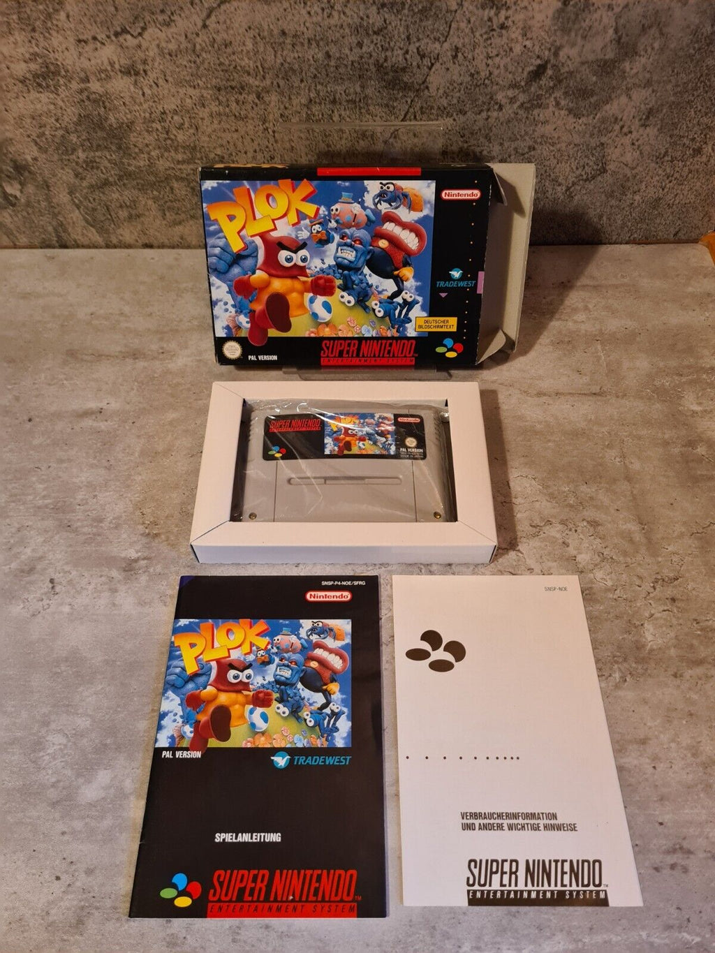 SNES Super Nintendo Plok mit OVP und Anleitung NOE/SFRG - T-Retro-Games 