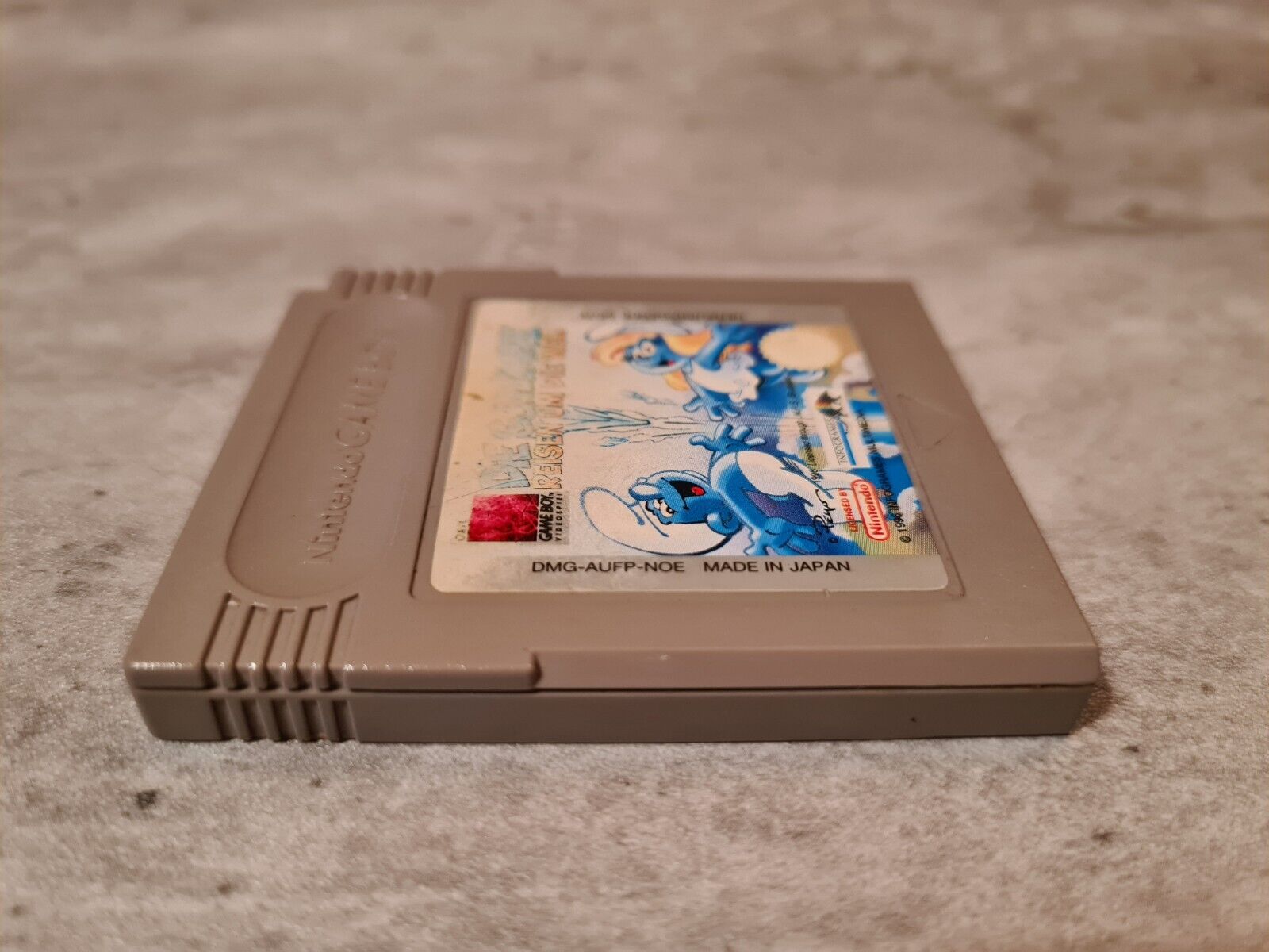 Nintendo Gameboy Classic Spiel Die Schlümpfe Reisen Um Die Welt Modul NOE - T-Retro-Games 