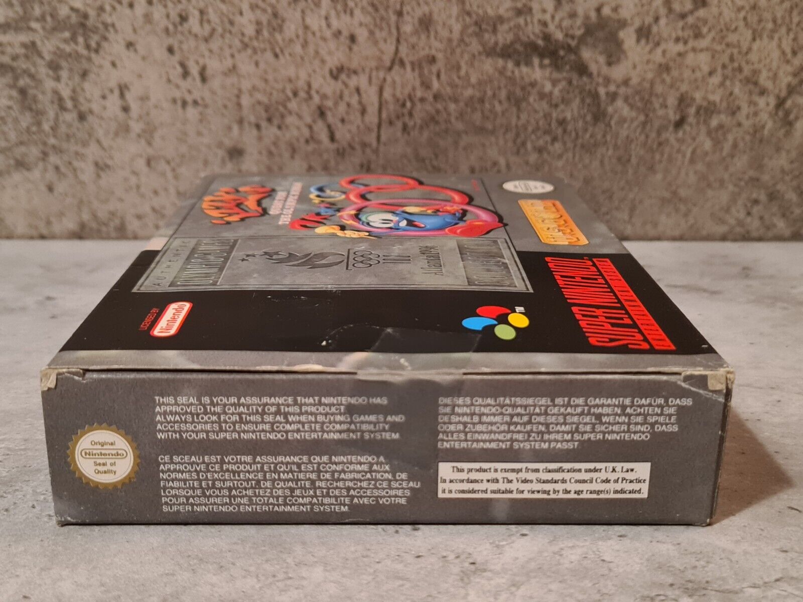 SNES Super Nintendo Izzy's Quest for the Olympic Rings mit OVP und Anleitung EUR - T-Retro-Games 